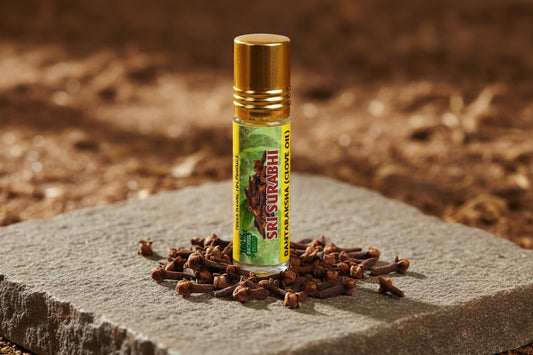 Small bottle labeled 'Sri Sankabhi' on a dark surface